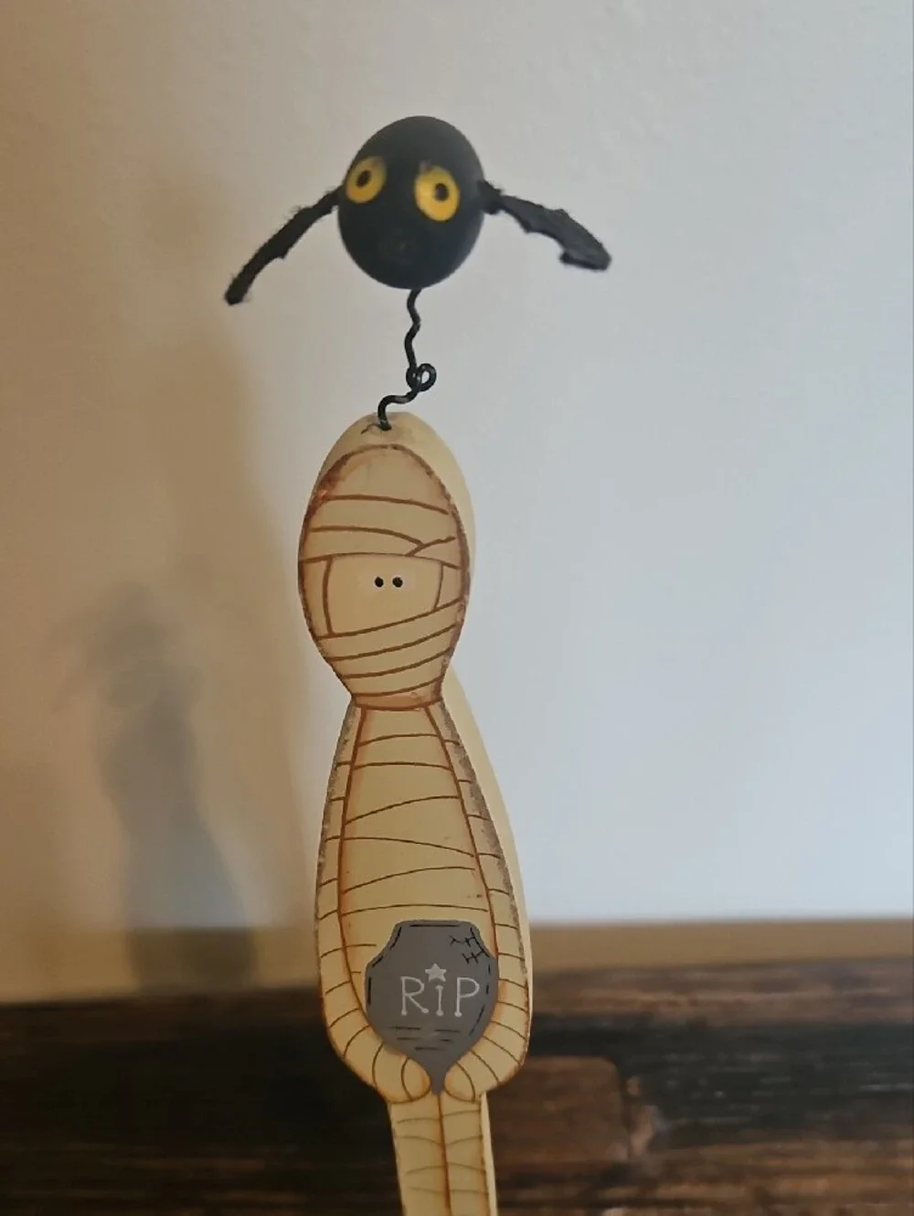 Decorative Cream Mummy Figurine with Black Bat Accent - Home Art